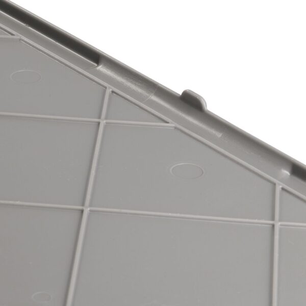 Close-up of the RCNXO2415-1's gray plastic surface, showing intersecting lines, raised edges, and a small protruding tab on one side.