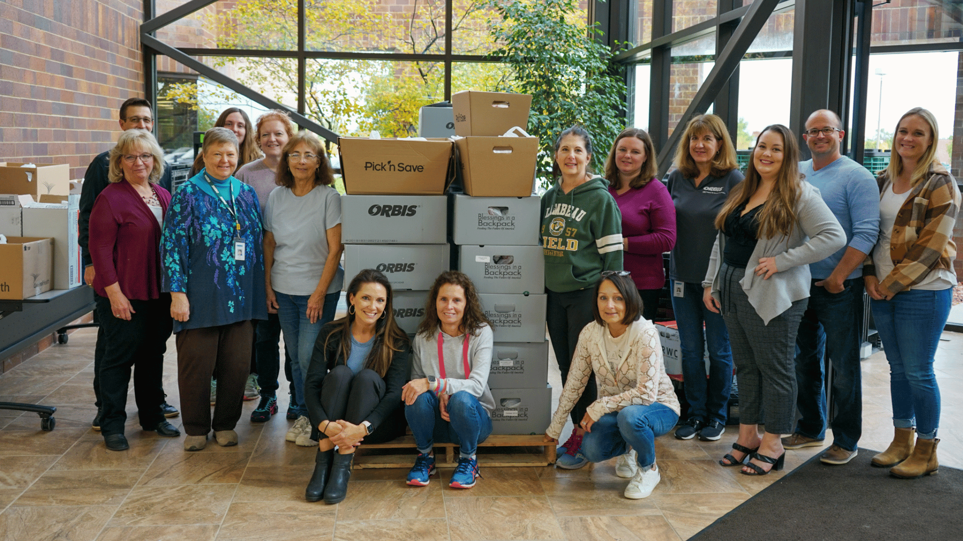 Blessings in a Backpack team filling boxes