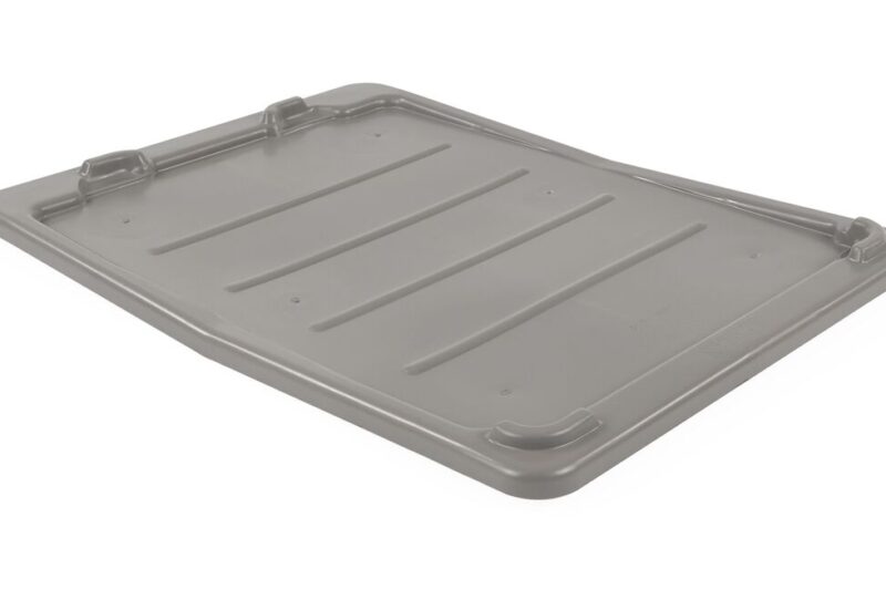 A rectangular, gray plastic lid with ridges, designed for a storage container.