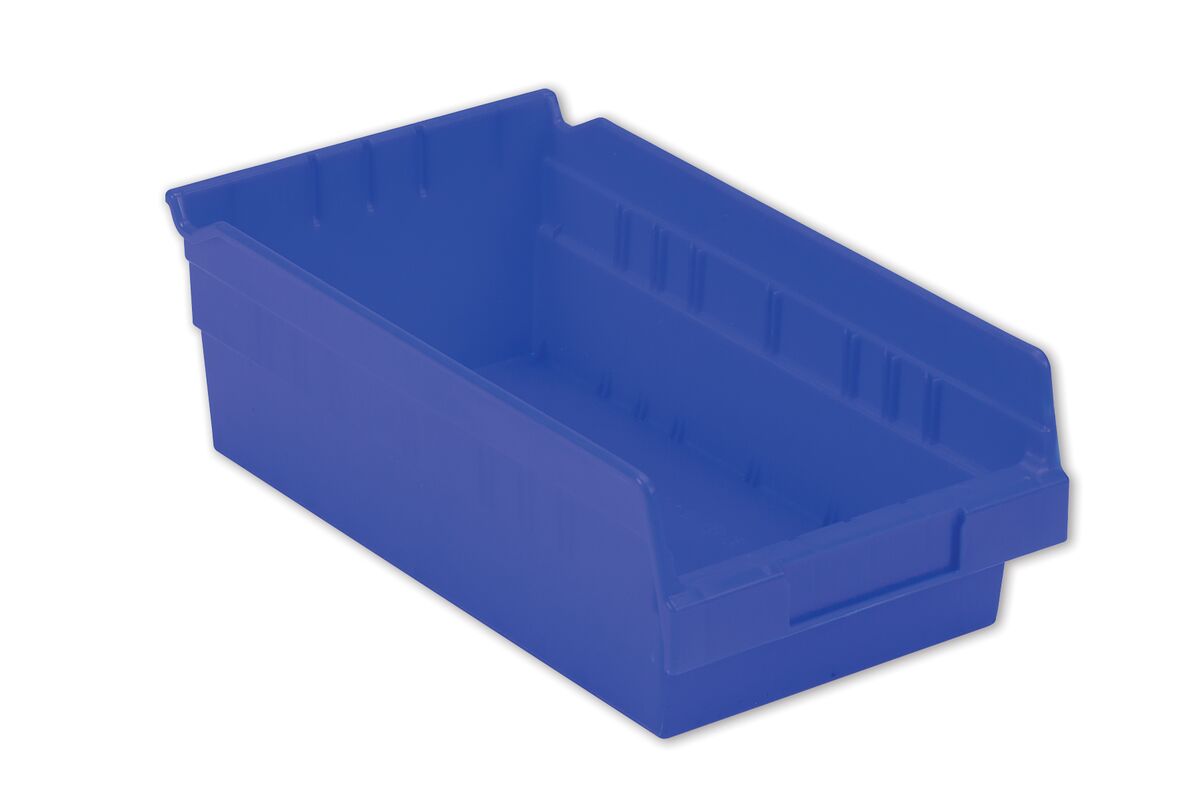 A blue plastic storage bin with a slanted open front and ridged interior details.